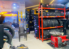 Fouji Tyres showroom with tyre racks and fitting equipment